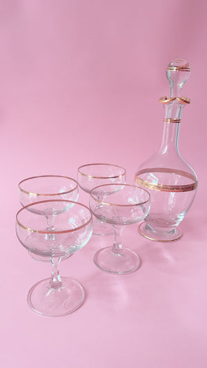 
            
                Load image into Gallery viewer, Vintage Gold Rimmed Coupes and Decanter Set
            
        