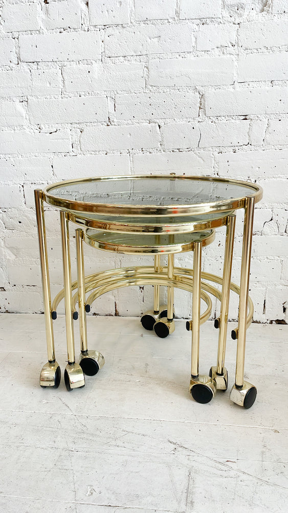 
            
                Load image into Gallery viewer, Vintage Brass and Smoked Glass Nesting Tables
            
        