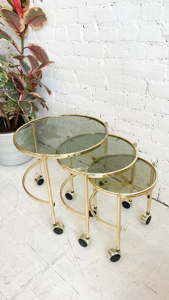 
            
                Load image into Gallery viewer, Vintage Brass and Smoked Glass Nesting Tables
            
        