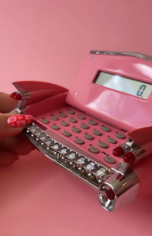 
            
                Load image into Gallery viewer, Vintage 1959 Pink Cadillac Desk Calculator
            
        
